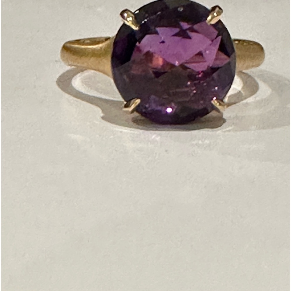 Carelle 18-K gold and amethyst ring.